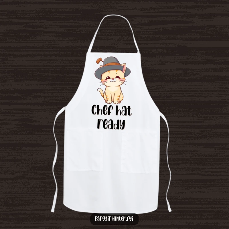 Funny cat apron with a playful cat character looking amused while wearing a ridiculously large hat, perfect for kitchen fun.