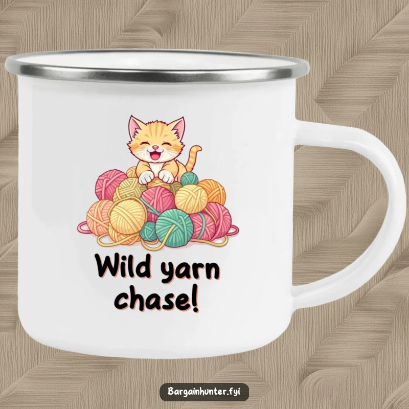 Funny kitten camping mug showing a gleeful kitten pouncing on a pile of discounted yarn balls.